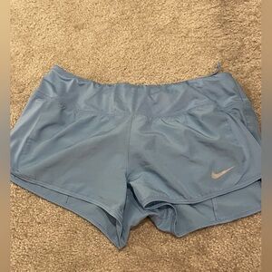 Nike baby blue dry fit shorts with draw string